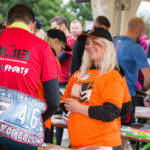 Woman volunteering at check in