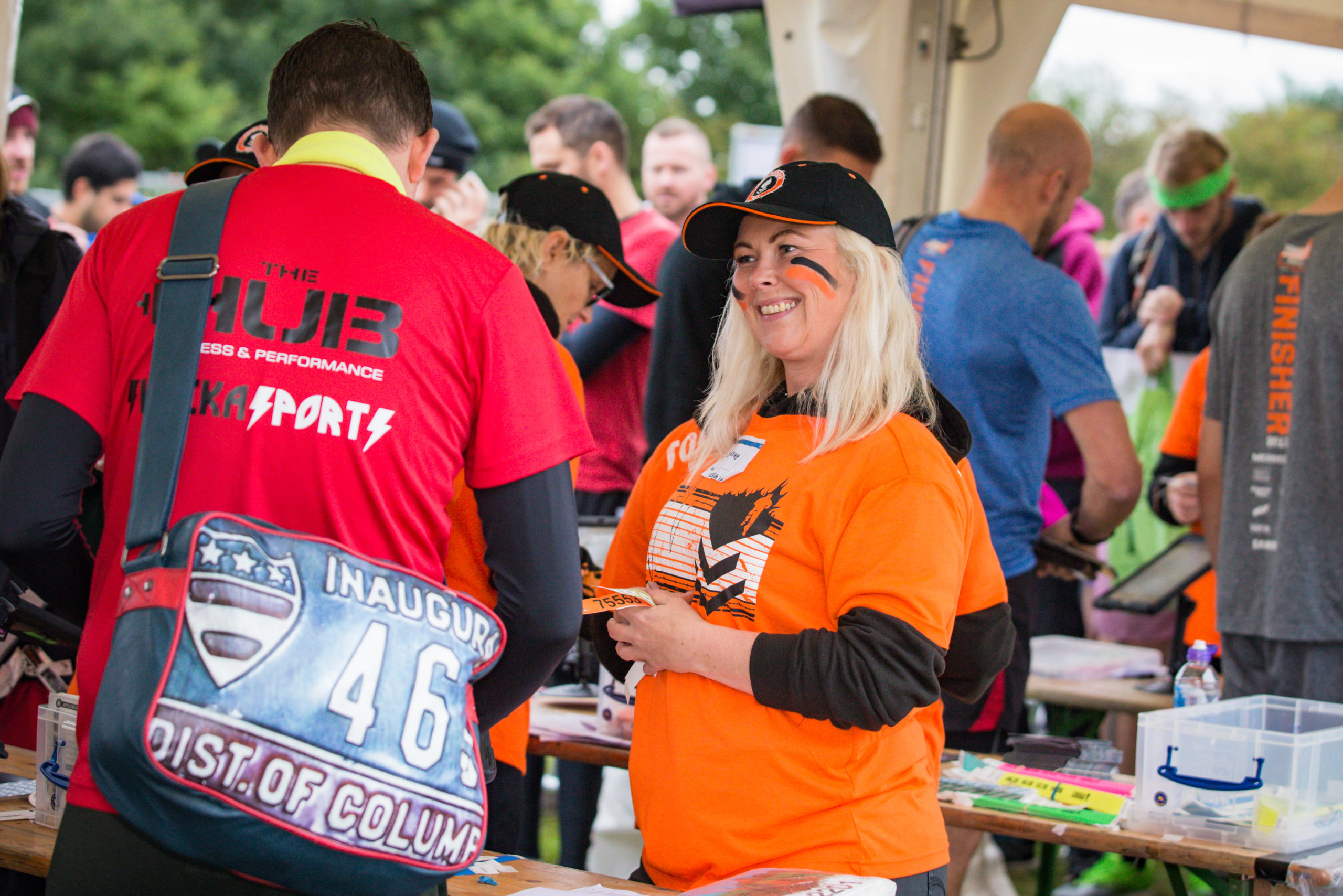 Woman volunteering at check in