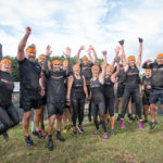 team and group at tough mudder