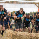 Participants running through the Electroshock Therapy