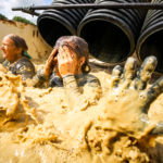 Participants fell into the mud from the tube
